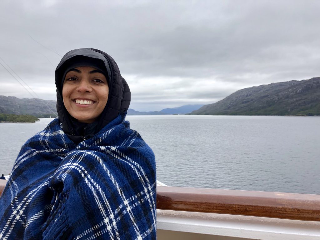 A photo of me bundled up on the cruise ship