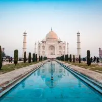 A photo of the Taj Mahal with a reflection pool.