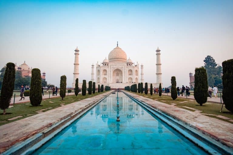 A photo of the Taj Mahal with a reflection pool.