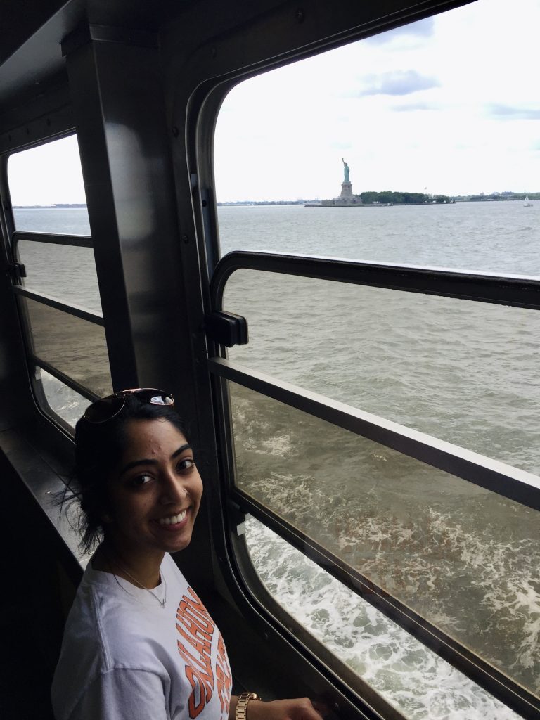 Me with the Statue of Liberty — don't forget this on your three-day itinerary for New York City
