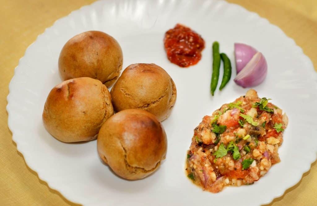 Be sure to try Litti Chokha which is a yummy Indian street food dish.