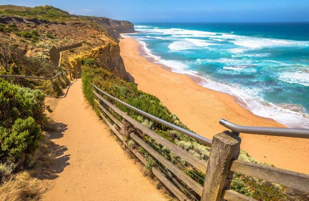 A walking path leading down to the beach area in Port Campbell, another one of the best Great Ocean Road stops.