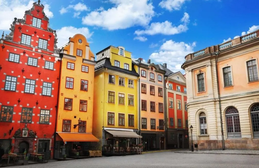 Red, orange, yellow, and other colorful buildings that make up the old town in Stockholm