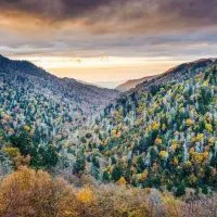 Fall foliage on the trees on the rolling hills which is one of the best views in the Smoky Mountains.