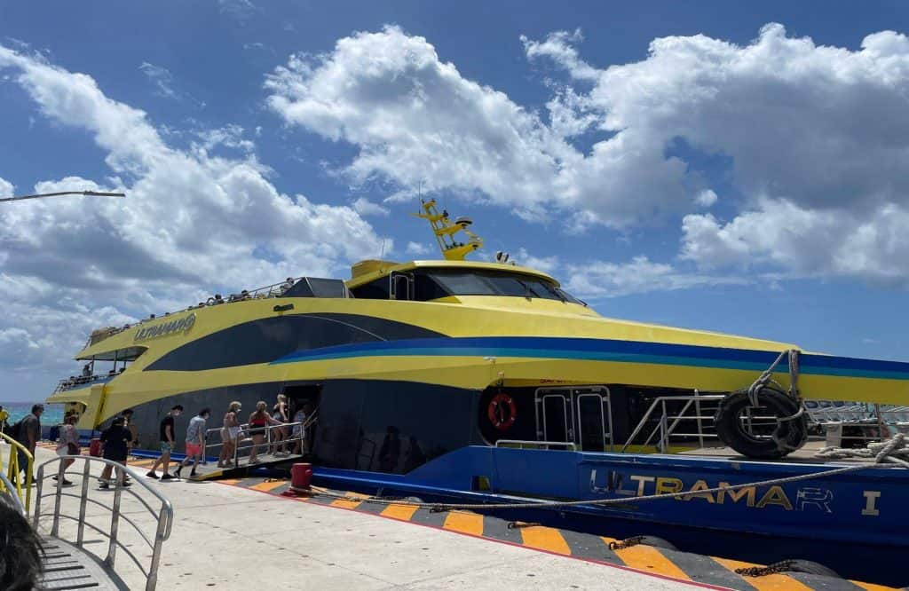 A yellow Ultramar ferry from Cozumel to Playa del Carmen.