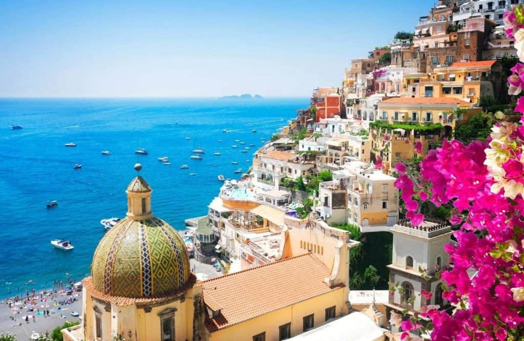 A coastline of buildings of the hillside of the Amalfi Coast, which is what is Italy famous for.