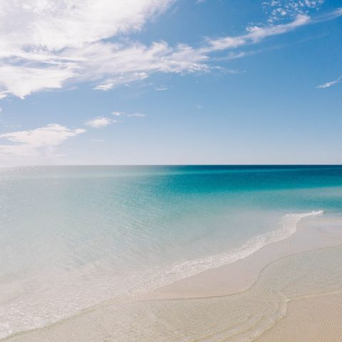 Crystal clear, blue waters and white sand of the best beaches in the Florida Panhandle.