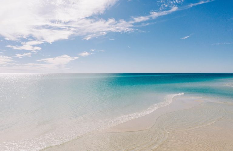 Crystal clear, blue waters and white sand of the best beaches in the Florida Panhandle.