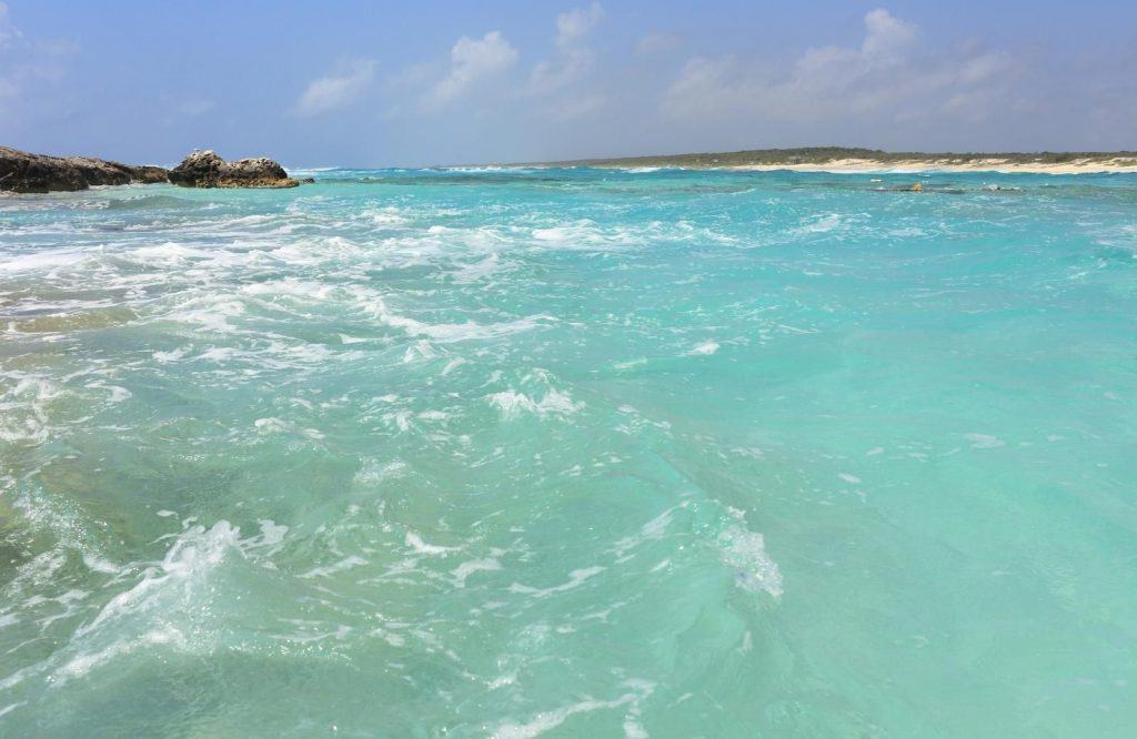 Beach with clear blue green waters for is Cozumel safe.