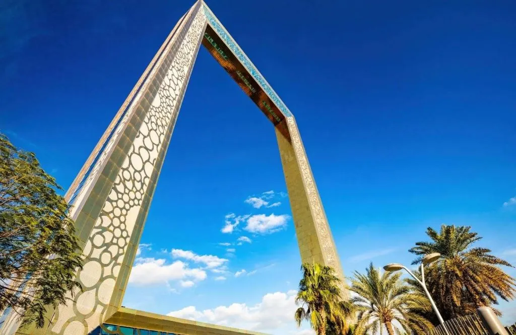 A square, gold frame which is known as the Dubai Frame.