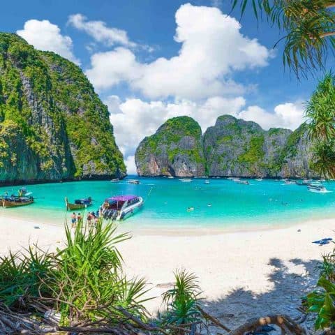 Gorgeous blue beach with limestone formations which is one of the best places to visit in Thailand for first timers.