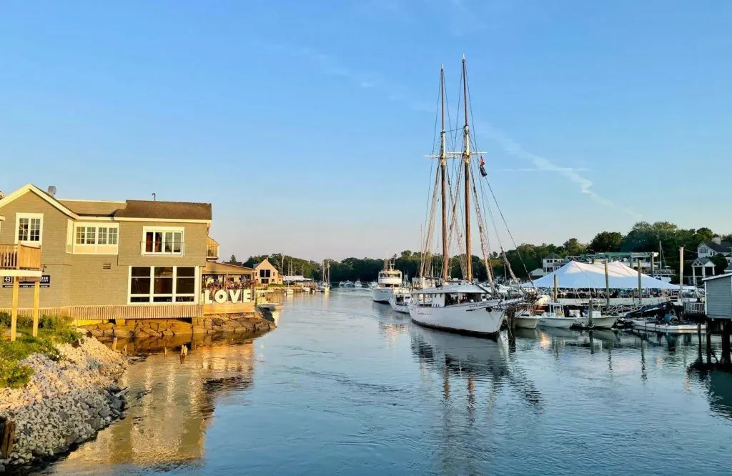 The river in Kennebunkport with restaurants and boats.