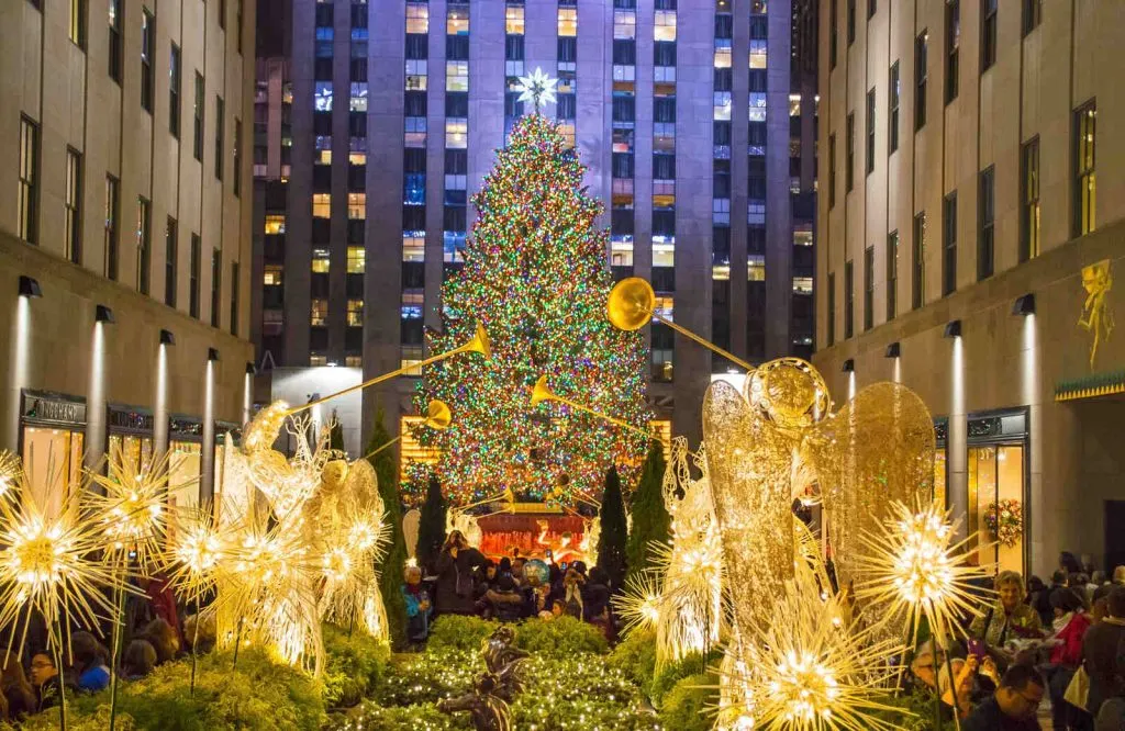 The Rockefeller Christmas Tree lit up, which is a must on any NYC Christmas bucket list.