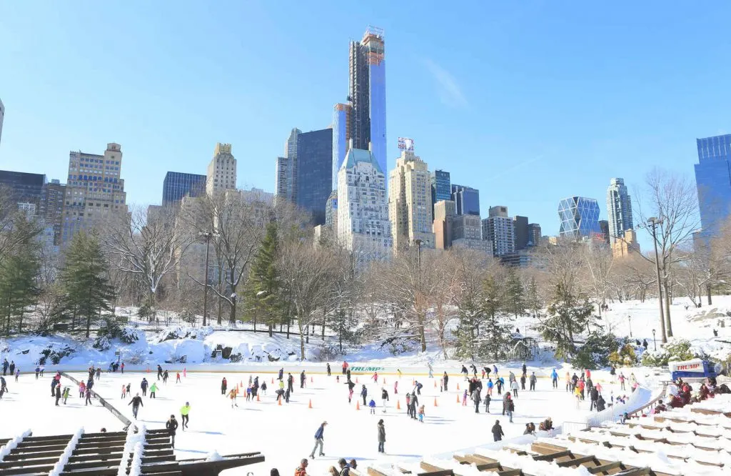 Wollman Ice Skating Rink under blue skies in Central Park.