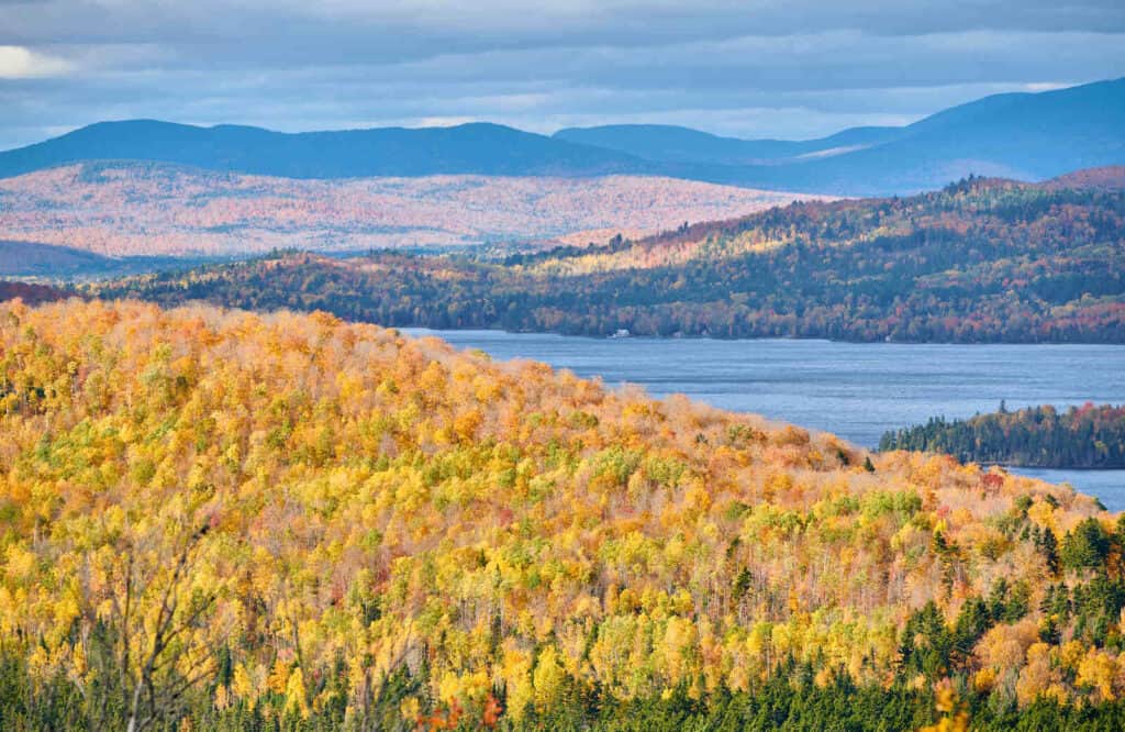 Fall foliage at Mooselookmeguntic Lake in the Rangeley Lakes Region in Maine.