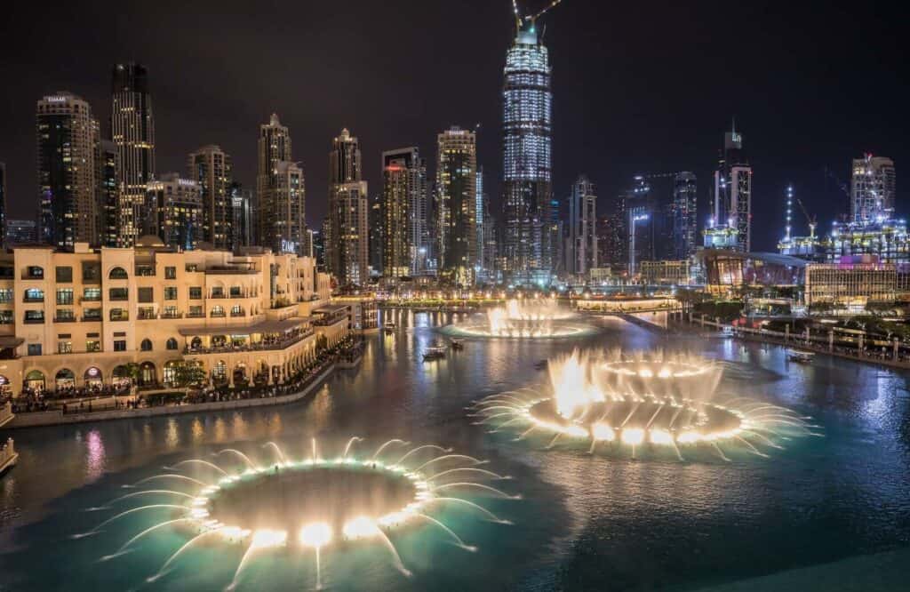An aerial evening view of the Dubai Fountains show at the Dubai Mall.