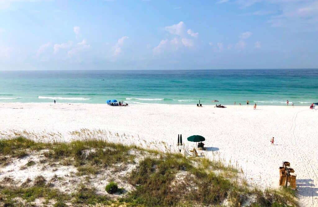 White powdery sand and turquoise waters on Miramar Beach, which is one of the best Destin Florida beaches.